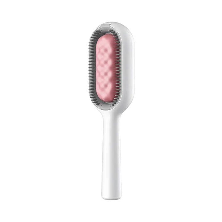 Pink Universal pet knot remover – tangle-free grooming tool for dogs & cats.